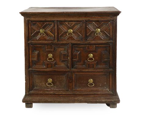 A Late 17th Century Geometric-Moulded Straight-Front Oak Chest of Drawers, of attractive proportions, the moulded top above f