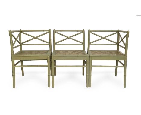 A Green-Painted Faux-Bamboo Modular Sofa, 20th century, with removeable green and cream floral squab cushions, in three secti