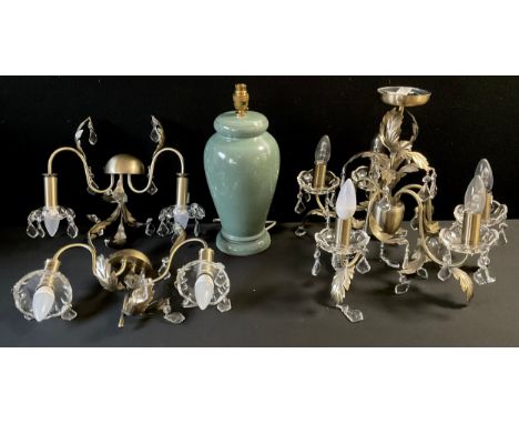 A perspex and silvered meal three light ceiling chandelier,  leafy branches, pendant drop;  a pair of conforming wall lights;