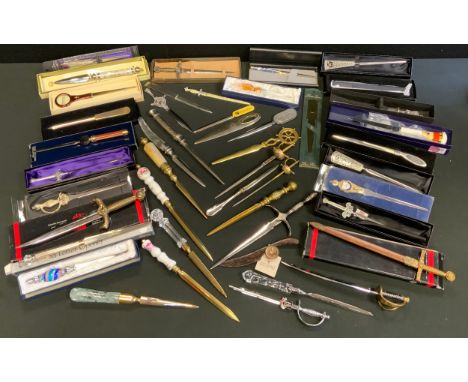 A St Justin pewter Celtic knot handle letter knife;  others magnifying glass, King Henry the Eight, Royal Worcester, Mother o