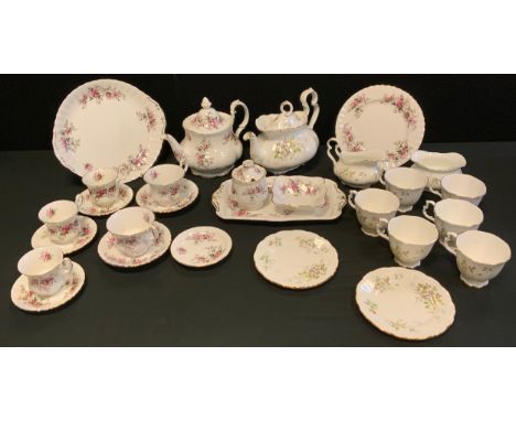 A Royal Albert Lavender Rose pattern part tea set, inc teapot, sandwich plate, bread plate, two tea cups and saucers, three s