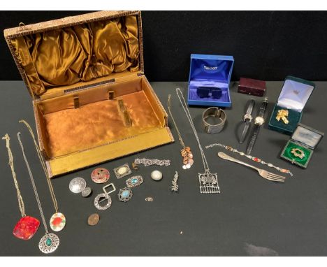 A silver hinged bangle, 36g;  silver plated and other brooches;  Tissot watches;  etc 