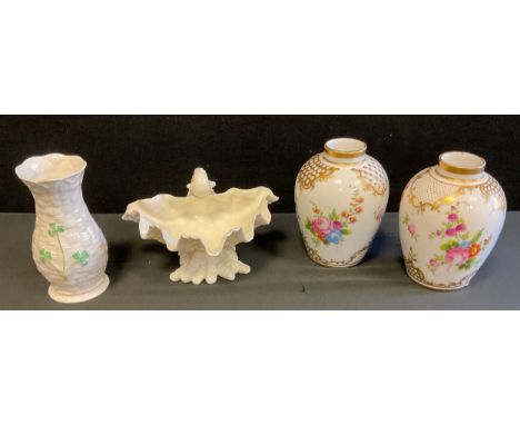 A pair of Dresden ovoid vases, decorated with summer flowers, picked out in gilt, 11.5cm high;  a Royal Worcester shell shape