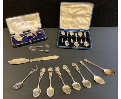 A set of six silver tea spoons, Sheffield 1931, cased;  a child's silver spoon and pusher, Sheffield 1930, cased;  a Victoria