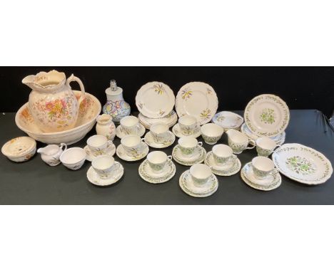 A Colclough tea service, printed with flower and foliage in green, printed mark;   another;  a Poole lamp base;  a Victorian 