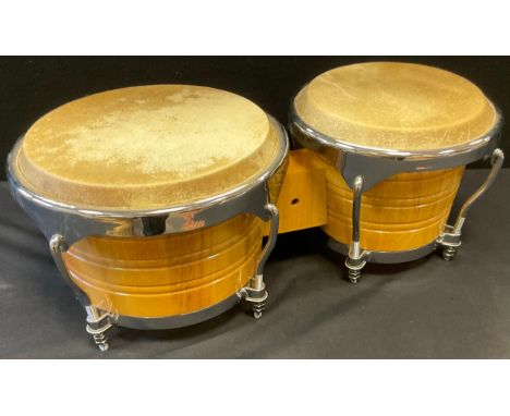 A pair of Bongo drums, 50cm wide 
