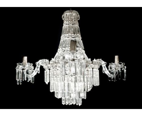LATE VICTORIAN MOULDED AND CUT GLASS THREE LIGHT CHANDELIER
of four tiered form and with three scrolled branches, hung overal