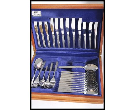 Two vintage 20th Century oak cased canteens of silver plated cutlery, one being a fish service.