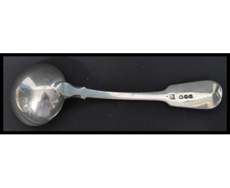 A hallmarked silver 19th century Georgian ladle in the fiddle pattern by Thomas Wallis (II) &amp; Jonathan Hayne. Hallmarked 