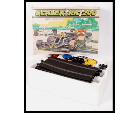 A vintage Scalextric 200 c532 electric model racing set twithin the box to include a incomplete c.025 Ferrari 312 car.&nbsp;