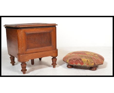 A Victorian 19th century mahogany step commode having hinged lid with inner lining, pull out step, all raised on turned legs.