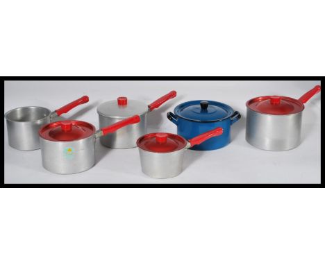 A group of vintage retro 20th century pots and pans dating from the 1950's to include a blue enamel lidded pot , various stai