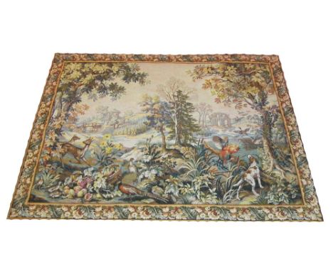 VERDU TAPESTRY, 215cm x 153cm, hunting scene within chestnut trees within a French floral border. 