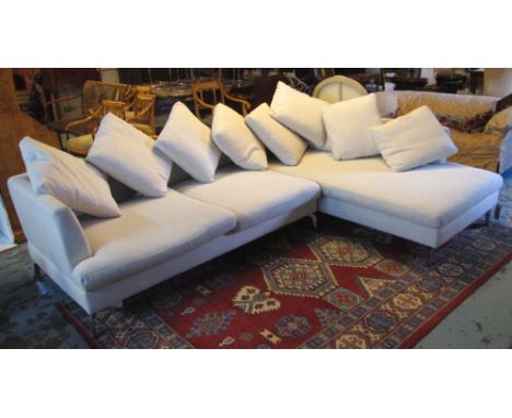 CORNER SOFA, reputedly from 'Minela by Delux Decor', in cream on metal supports, unstamped, 78cm H x 195cm D x 310cm D. 