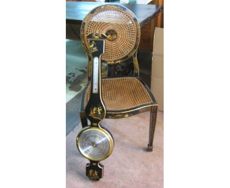 CHINOISERIE CHAIR, Edwardian, black and gilt decorated, with caned back and seat; plus a later barometer in similar taste, 92