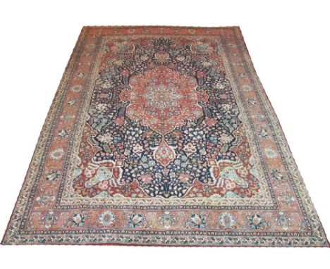 VINTAGE TABRIZ CARPET, 350cm x 252cm, pendant medallion on a sapphire field with palmettes and vines within a corresponding t