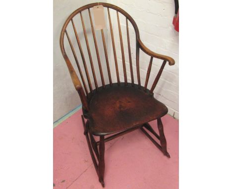 ROCKING CHAIR, 19th century oak, birch and pine, with stick back and solid seat, 55cm W x 43cm D x 89cm H. 