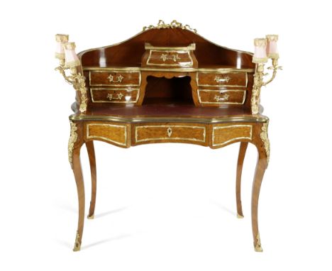 A FRENCH KINGWOOD BONHEUR DU JOUR IN LOUIS XV STYLE LATE 19TH / EARLY 20TH CENTURY with ormolu mounts, the raised shaped back