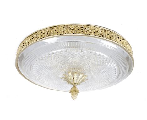 A LARGE IRISH CUT GLASS AND ORMOLU FLUSH CEILING LIGHT FITTING with a grapevine collar above a fluted and cut glass shade wit