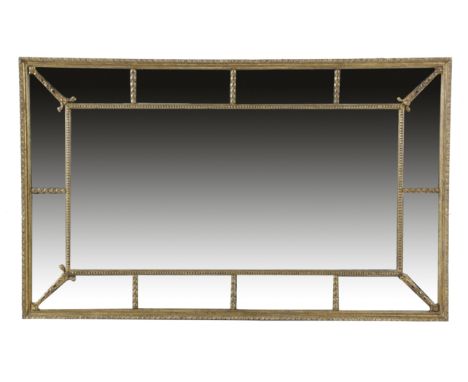 A GEORGE III GILTWOOD WALL MIRROR C.1790 the later central rectangular plate within a beaded slip, surrounded by marginal pla