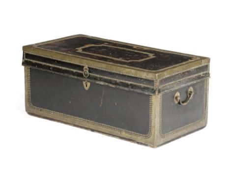 AN ANGLO-CHINESE CAMPHORWOOD TRUNK 19TH CENTURY covered in leather, with brass edging and studded decoration, with side carry