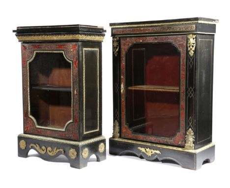 λ TWO NAPOLEON III EBONISED AND BOULLE MARQUETRY DISPLAY CABINETS C.1870 with ormolu mounts and panels of cut-brass marquetry