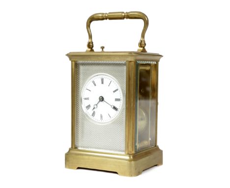 A FRENCH GILT BRASS CARRIAGE CLOCK LATE 19TH CENTURY the brass eight day repeating movement with a platform lever escapement 