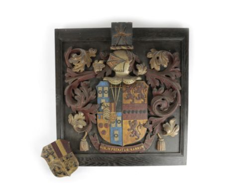 A CARVED AND POLYCHROME DECORATED COAT OF ARMS LATE 19TH CENTURY for Charles Paulet Camborne Paynter (d.1947) and his wife Ma