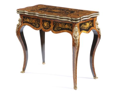 A FRENCH KINGWOOD AND MARQUETRY SERPENTINE CARD TABLE IN LOUIS XV STYLE C.1870 with ormolu mounts, the top inlaid with musica