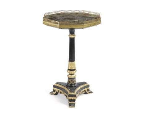 A REGENCY EBONISED AND PARCEL GILT OCCASIONAL TABLE EARLY 19TH CENTURY the octagonal mottled marble top with a gilt brass pie