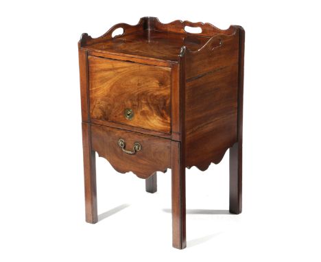 A GEORGE III MAHOGANY TRAY-TOP BEDSIDE COMMODE LAST QUARTER 18TH CENTURY the shaped gallery with three pierced handgrips, abo