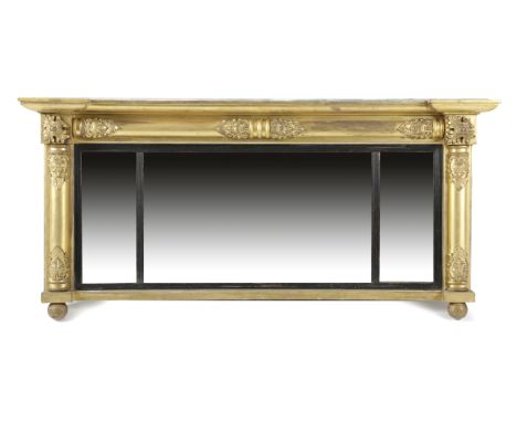 A WILLIAM IV GILTWOOD AND GESSO LANDSCAPE OVERMANTEL MIRROR C.1830 with three rectangular plates within an ebonised reeded sl