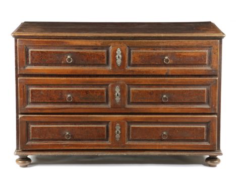 AN ITALIAN PAINTED OAK COMMODE LATE 18TH / EARLY 19TH CENTURY decorated to simulate rosewood, with three long panelled drawer