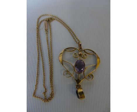 9ct gold amethyst set heart shaped pendant on 9ct gold chain 