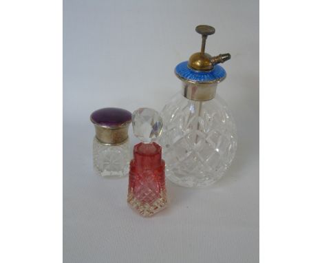 3 Vintage cut glass scent bottles 2 with enamel and silver tops