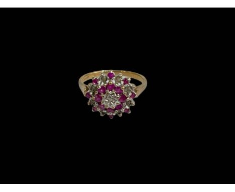 Ruby and diamond cluster 9 carat gold ring, size M.