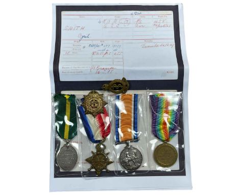 Long Service medal awarded to 74-240521 DVR. C. Smith R. A. S. C, together with WWI trio medals named to 1258 DVR. C. Smith R