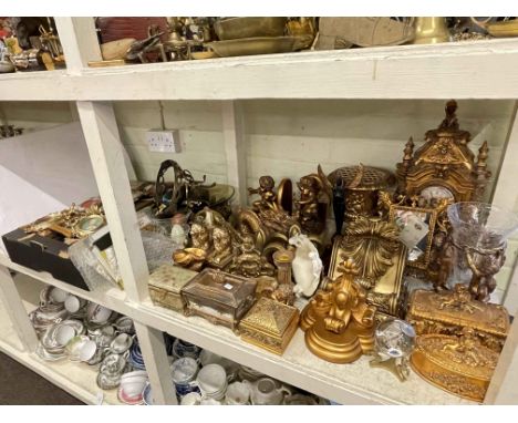 Collection of gilt coloured wares including wall sconces, photograph frames, trinket boxes, mantel clock, table lamps, horse 