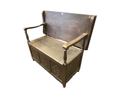 Dark oak triple panel front monks bench, 86.5cm by 118cm by 54cm (closed).