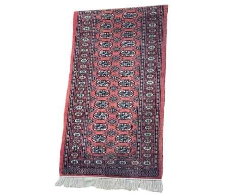 Bokhara style carpet runner 3.03 by 0.80.