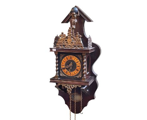 Mahogany and brass decorated double weight wall clock.