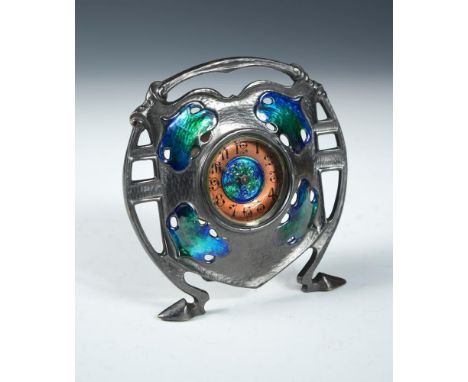 An Art Nouveau pewter and enamel decorated timepiece in the manner of Liberty & Co., by The British United Clock Co., the pie