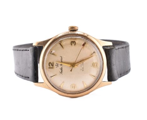 A 9ct gold Smiths Imperial gentleman's wristwatch. The Smiths Imperial wristwatch having Panerai indices and dauphine hands t