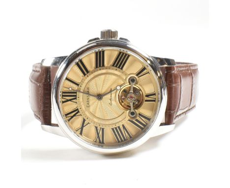 An Earnshaw contemporary stainless steel and leather gentleman's wristwatch. The watch with engine turned dial having exposed