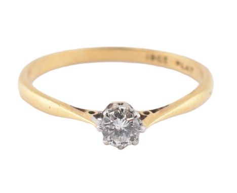 An 18ct gold, platinum and diamond solitaire ring. The 18ct yellow gold ring set with a single eight claw set round brilliant