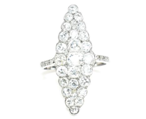 A diamond cluster ring. The ring having a marquise shaped head set with 35 diamonds largely old cut diamonds with rose cut di