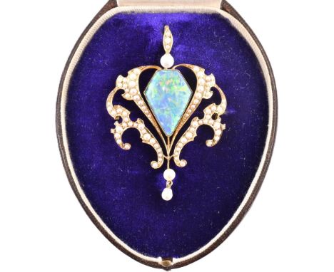 An Edwardian 15ct gold, opal and pearl brooch pin cased. The Edwardian 15ct gold necklace pendant having a central lonzenge-s