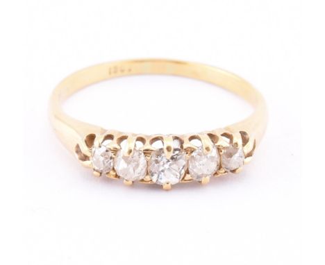 18ct gold five stone diamond ring. The ring having five graduating old cut diamonds to tapering shank. Marked 18, makers mark
