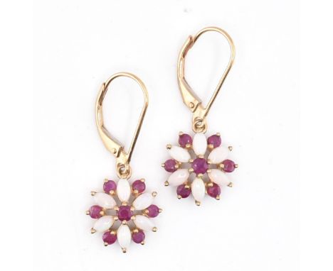 A pair of ruby and opal floral cluster pendant earrings with French lever clasps. The earrings stamped 9K. Weight 2.1g. Measu