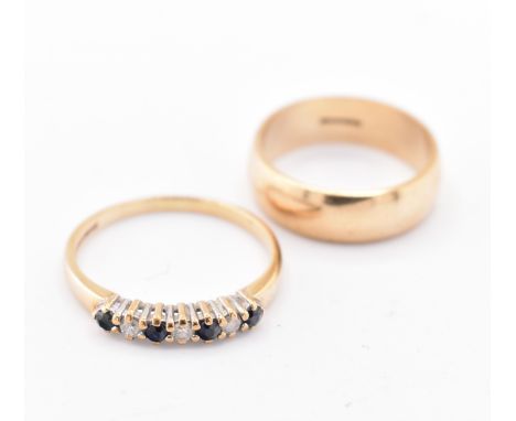 A hallmarked 9ct gold band ring and a hallmarked 9ct gold, sapphire and diamond half hoop ring. The lot to include a hallmark